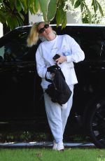 ERIKA JAYNE Arrives at a Friend