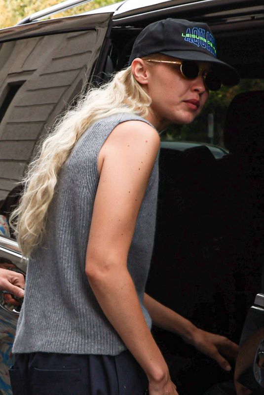 GIGI HADID Leaves Her Hotel for Versace Show in Milan 09/23/2022