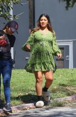GINA RODRIGUEZ Takes a Break on the Set of Not Dead Yet in Los Angeles 09/26/2022