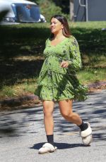 GINA RODRIGUEZ Takes a Break on the Set of Not Dead Yet in Los Angeles 09/26/2022