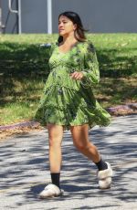 GINA RODRIGUEZ Takes a Break on the Set of Not Dead Yet in Los Angeles 09/26/2022