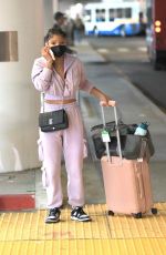 HALLE BAILEY Arrives at LAX Airport in Los Angeles 09/22/2022