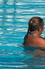 JACQUELINE JOSS in Swimsuit at a Pool on Vacation in Spain 08/21/2022