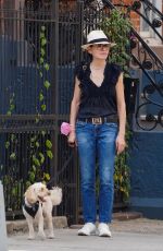 JULIANNA MARGUILES Out with Her Dog in New York 08/31/2022