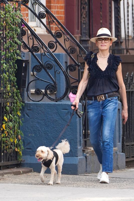 JULIANNA MARGUILES Out with Her Dog in New York 08/31/2022