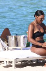 KELLY ROWLAND in Bikini at a Beach in Miami 09/01/2022