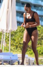 KELLY ROWLAND in Bikini at a Beach in Miami 09/01/2022