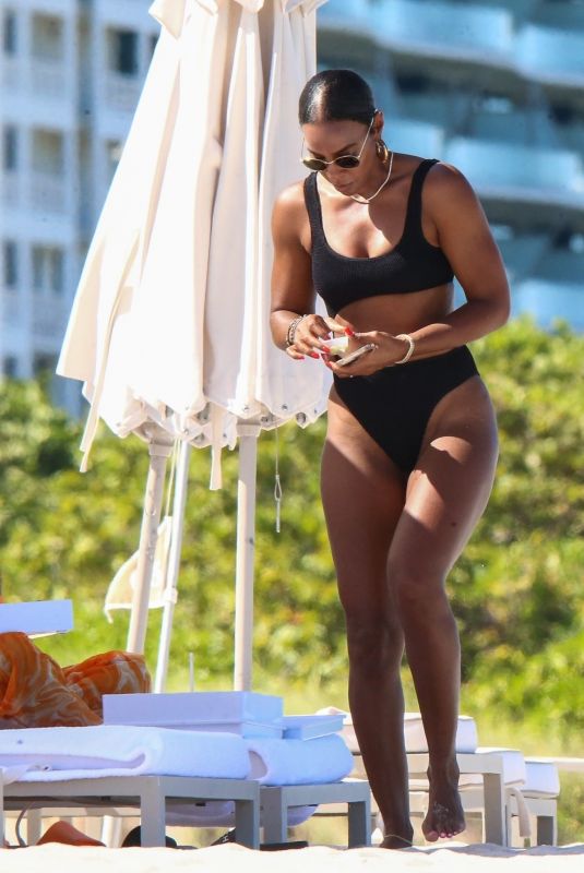KELLY ROWLAND in Bikini at a Beach in Miami 09/01/2022