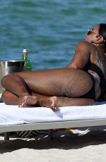 KELLY ROWLAND in Bikini at a Beach in Miami 09/01/2022