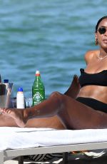 KELLY ROWLAND in Bikini at a Beach in Miami 09/01/2022