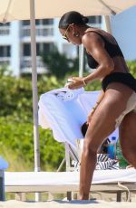 KELLY ROWLAND in Bikini at a Beach in Miami 09/01/2022