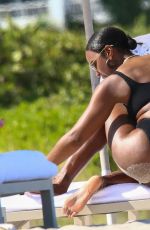 KELLY ROWLAND in Bikini at a Beach in Miami 09/01/2022