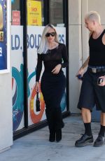 KIM KARDASHIAN and Her Photographer at a Gas Station in Woodland Hills 08/31/2022