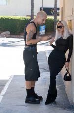 KIM KARDASHIAN and Her Photographer at a Gas Station in Woodland Hills 08/31/2022