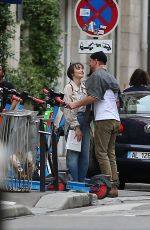 LILY COLLINS and Charlie McDowell Out for a Scooter Ride in Paris 09/15/2022