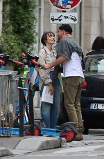LILY COLLINS and Charlie McDowell Out for a Scooter Ride in Paris 09/15/2022
