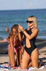 LISA OPIE and RAMINA ASHFAQUE in Bikinis at a Beach in Miami 09/13/2022