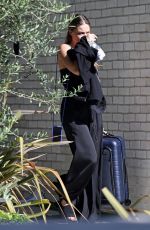 MARGOT ROBBIE Leaves Cara Delevingne