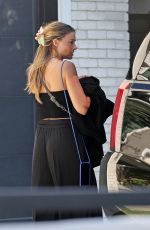 MARGOT ROBBIE Leaves Cara Delevingne