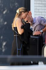 MARGOT ROBBIE Leaves Cara Delevingne