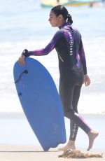 MILA KUNIS in Wetsuit at a Beach in Santa Barbara 09/04/2022