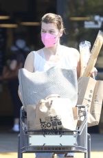 MILLA JOVOVICH at Gas Station and a Grocery Store in Los Angeles 09/04/2022