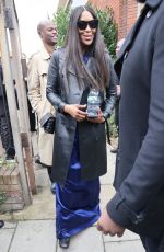 NAOMI CAMPBELL Leaves Burberry Catwalk Show at London Fashion Week 09/26/2022