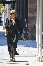 NAOMI WATTS Out with Her Dog Izzy in New York 09/17/2022