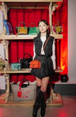 NATALIA DYER at Longchamp Launch Event in New York 09/07/2022