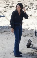 NEVE CAMPBELL Filming Scenes at a Beach in Malibu 09/20/2022