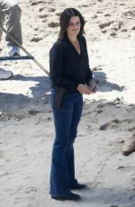 NEVE CAMPBELL Filming Scenes at a Beach in Malibu 09/20/2022