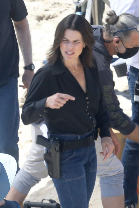 NEVE CAMPBELL Filming Scenes at a Beach in Malibu 09/20/2022