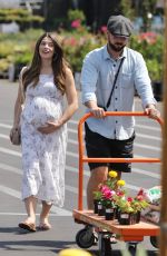 Pregnant ASHLEY GREENE and Paul Khoury Shopping for Gardening Equipment at Home Depot in Los Angeles 09/13/2022