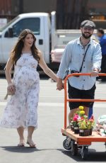Pregnant ASHLEY GREENE and Paul Khoury Shopping for Gardening Equipment at Home Depot in Los Angeles 09/13/2022