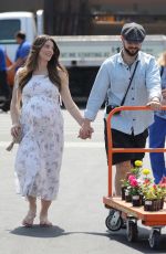 Pregnant ASHLEY GREENE and Paul Khoury Shopping for Gardening Equipment at Home Depot in Los Angeles 09/13/2022
