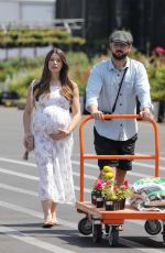 Pregnant ASHLEY GREENE and Paul Khoury Shopping for Gardening Equipment at Home Depot in Los Angeles 09/13/2022