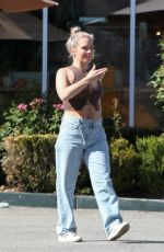 SHARNA BURGESS and Brian Austin Green Shopping at Erewhon Market in Calabasas 09/26/2022