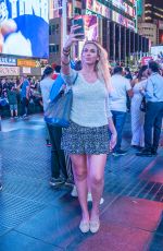TANIA AMRIE CARINGI Out at Times Square in New York 09/25/2022