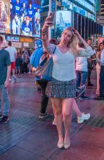 TANIA AMRIE CARINGI Out at Times Square in New York 09/25/2022
