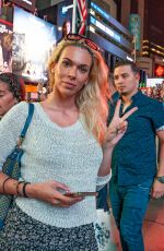 TANIA AMRIE CARINGI Out at Times Square in New York 09/25/2022