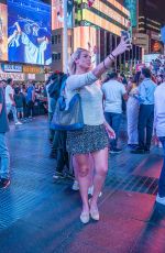 TANIA AMRIE CARINGI Out at Times Square in New York 09/25/2022