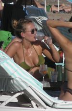 TIFFANY and LUCY WATSON in Bikinis on the Beach in Barcelona 09/01/2022