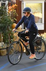 ALYSON HANNIGAN Out Riding a Bike in Brentwood 10/08/2022