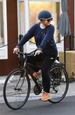 ALYSON HANNIGAN Out Riding a Bike in Brentwood 10/08/2022