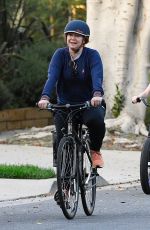 ALYSON HANNIGAN Out Riding a Bike in Brentwood 10/08/2022