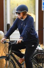 ALYSON HANNIGAN Out Riding a Bike in Brentwood 10/08/2022