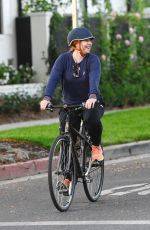 ALYSON HANNIGAN Out Riding a Bike in Brentwood 10/08/2022