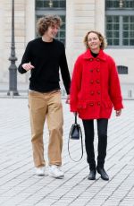 AMBER VALLETTA Out with Her Don Auden McCaw in Paris 10/01/2022