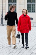 AMBER VALLETTA Out with Her Don Auden McCaw in Paris 10/01/2022