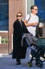ASHLEY TISDALE and Christopher French Out with Their Baby in New York 10/16/2022